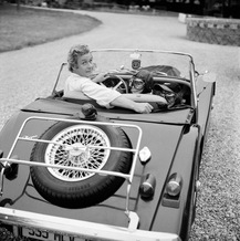 Christian de Pange in his Morgan outside the Chateau de Maillebois