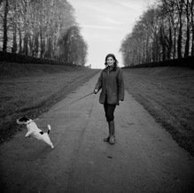 Sylvie Armand-Delille with Cookie at the entrance to the Chateau de Maillebois